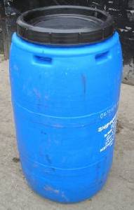 Blue plastic storage tub converted to be used as a water butt