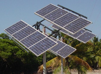 Solar panels fitted to pole mounted solar trackers.