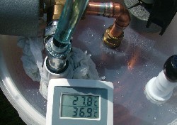 Indoor / outdoor thermometer used to measure ambient air temperature and temperature of heated water