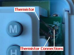 Thermistor used in a battery powered thermostat timer switch