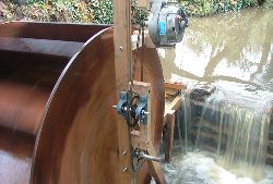 http://www.reuk.co.uk/OtherImages/alternator-and-gearing-fitted-to-waterwheel.jpg