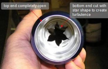 Star shaped hole cut into base of cans for a solar air heating panel
