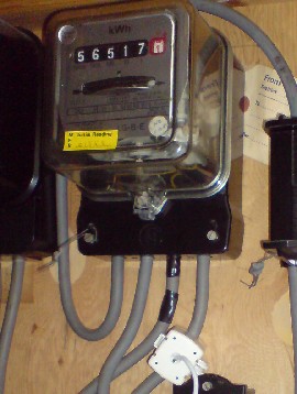 Efergy sensor installed on the live output cable from the electricity meter