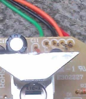 Solder four leads to the terminals which held the ribbon cable