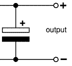 Capacitor placed in circuit between positive and negative DC outputs of the bridge rectifier