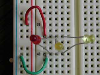 Using a solderless breadboard to prototype an LED circuit.