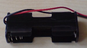 2 AA BATTERY HOLDER WITH LEADS. Battery holder for 2 AA sized batteries with 10cm long fitted flying leads